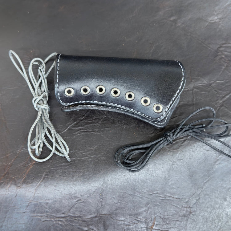 *In Stock* Shockwave Raptor Grip Wrap – Mossberg 500/590 Black Leather w/Antique Nickel Eyelets