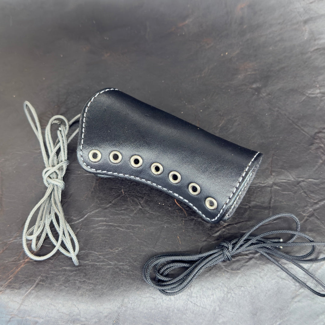 *In Stock* Shockwave Raptor Grip Wrap – Mossberg 500/590 Black Leather w/Antique Nickel Eyelets